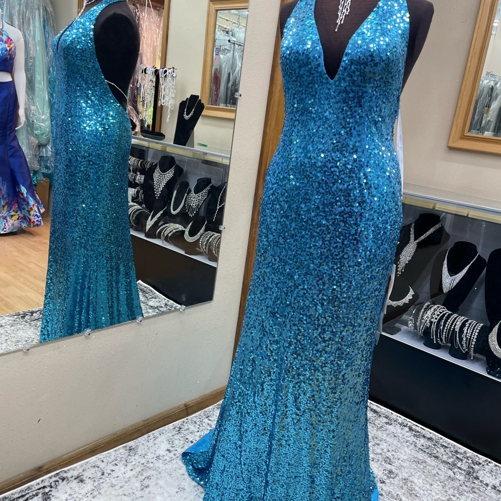 Jasz Couture size 12. Color: turquoise. Brand new with tags.